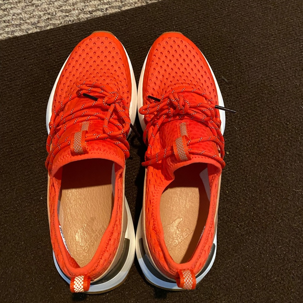 Red sorel kinetic impact sneakers size 9